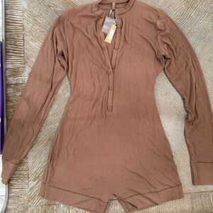 SKIMS longsleeve bodysuit with shorts. Brown